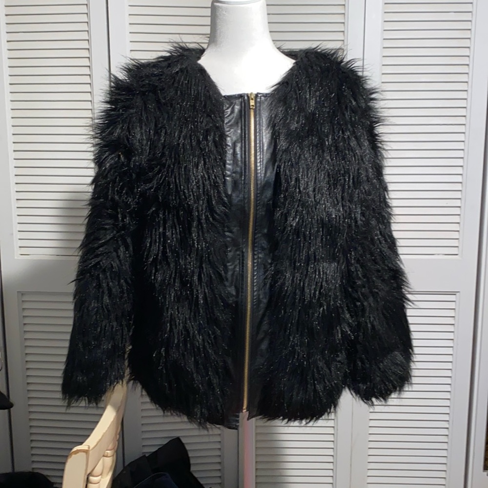 Faux Fur and Pleather Coat in Black with gold zipper in Size Medium.